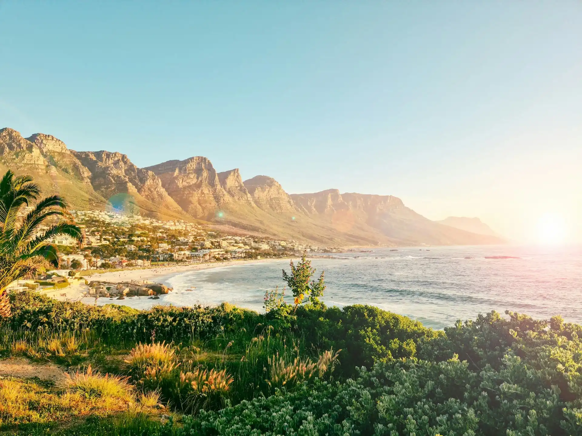 Sunset view over Camps Bay and the Twelve Apostles mountain range in Cape Town Sunset view over Camps Bay and the Twelve Apostles mountain range in Cape Town